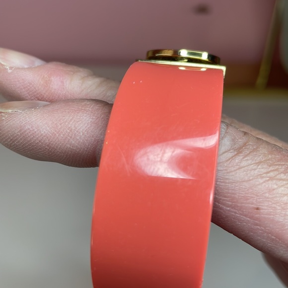 Fossil pinkish salmon colored hard plastic and gold tone bangle/cuff bracelet - Picture 8 of 8